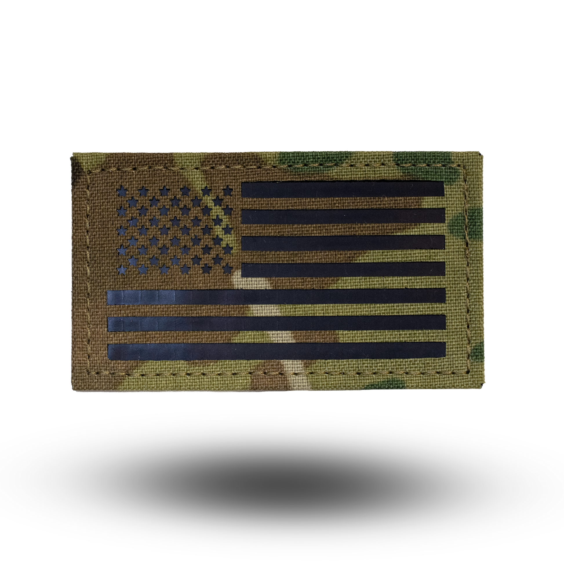 Camouflage American flag patch on a white background
